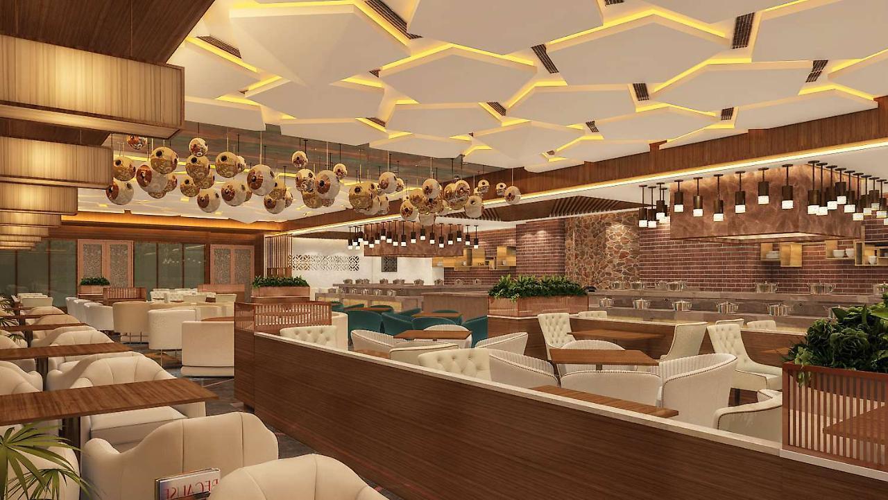 Radisson Blu Towers Kaushambi Delhi NCR Hotel Ghaziabad Bagian luar foto Interior of a restaurant