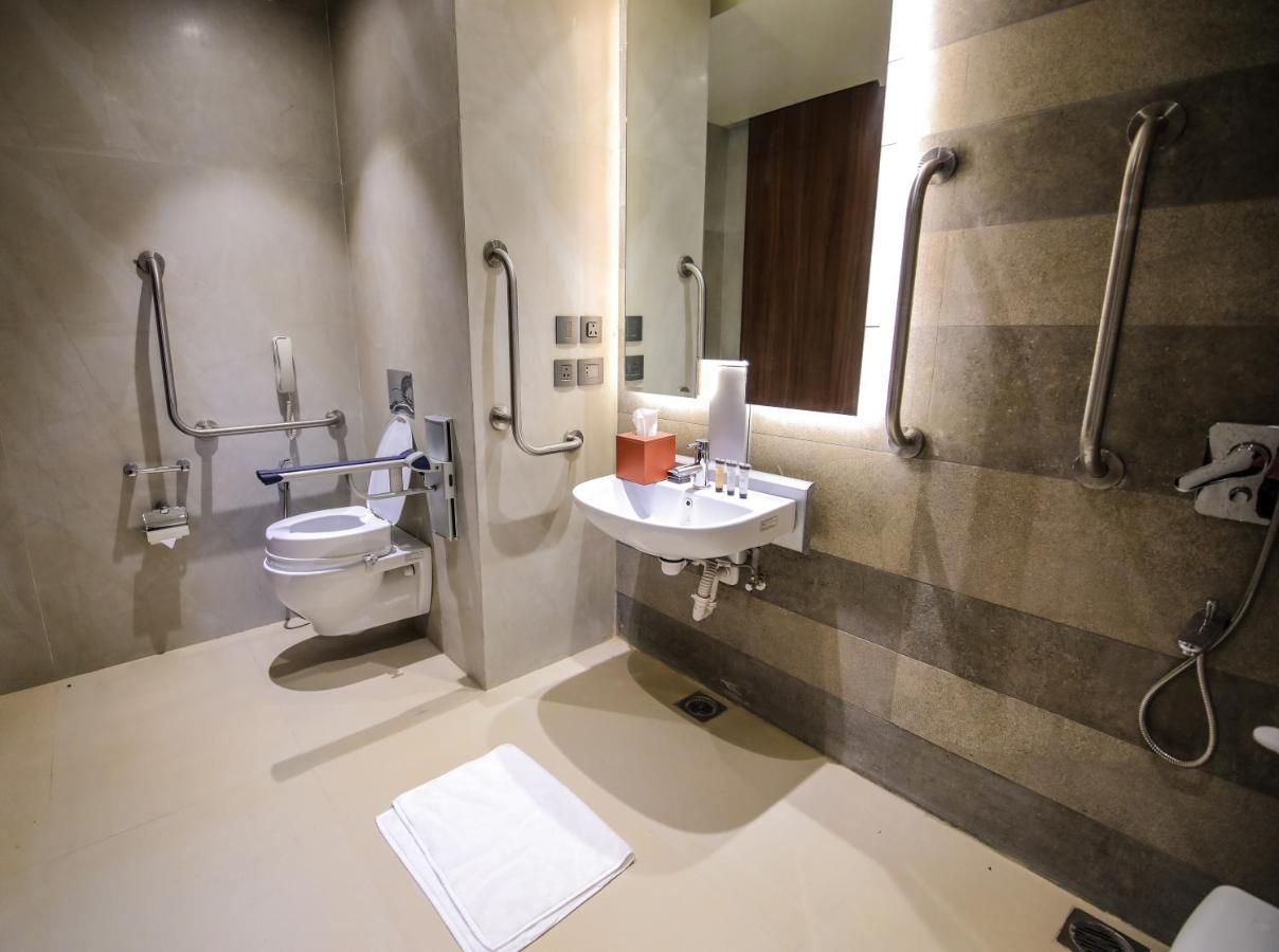 Radisson Blu Towers Kaushambi Delhi NCR Hotel Ghaziabad Bagian luar foto Disabled toilet with a disabled shower